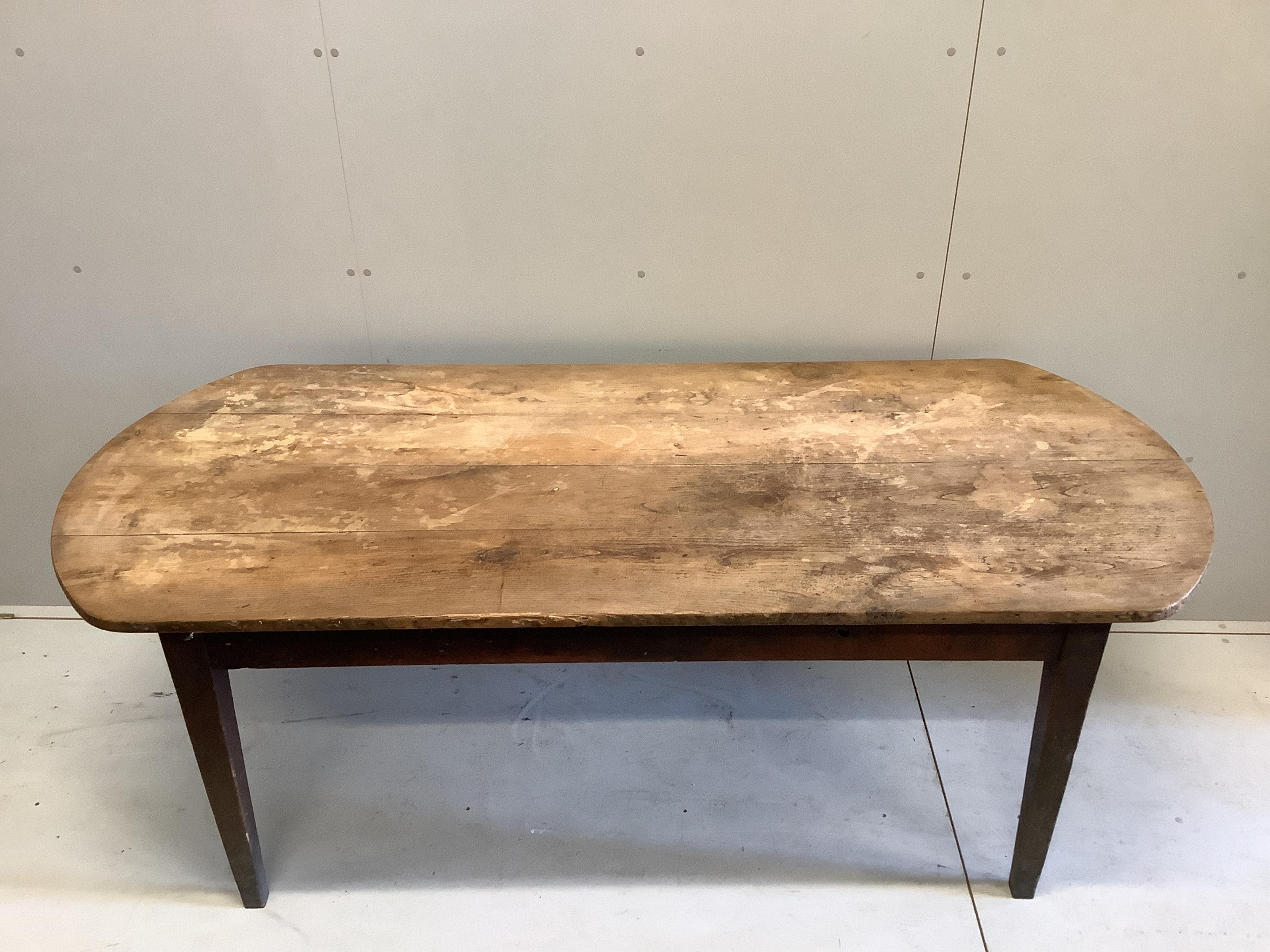 A French oak kitchen table, width 196cm, depth 87cm, height 72cm. Condition - well worn condition but essentially sound